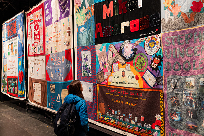 A student views the AIDS quilt
