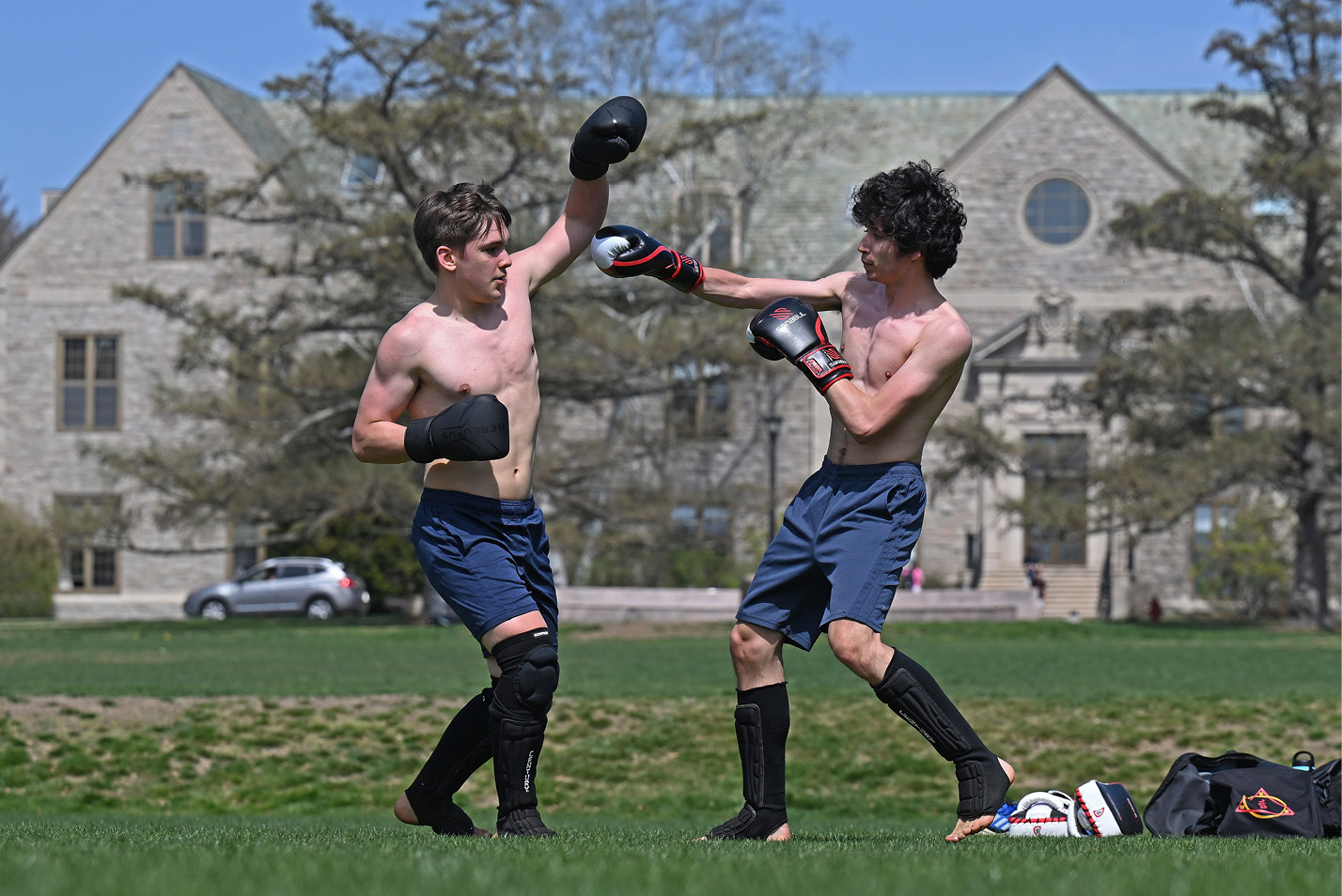 Two students box on the Green