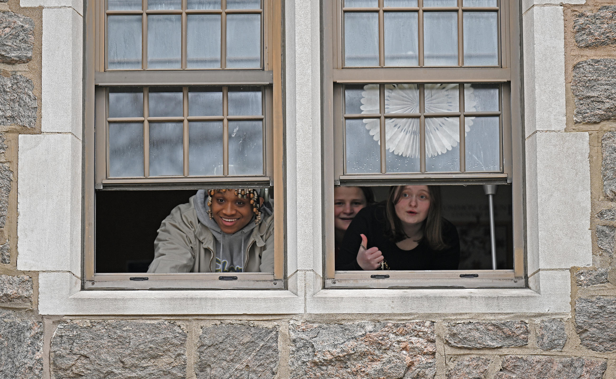 Students looking out a window