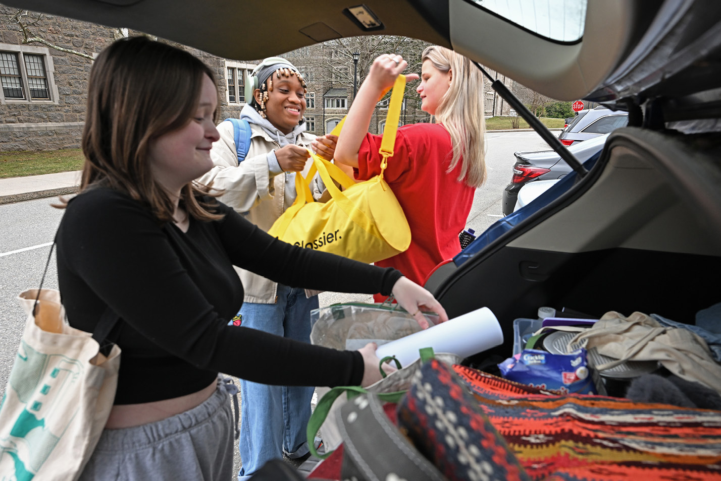 Students unloading car during January move-in.