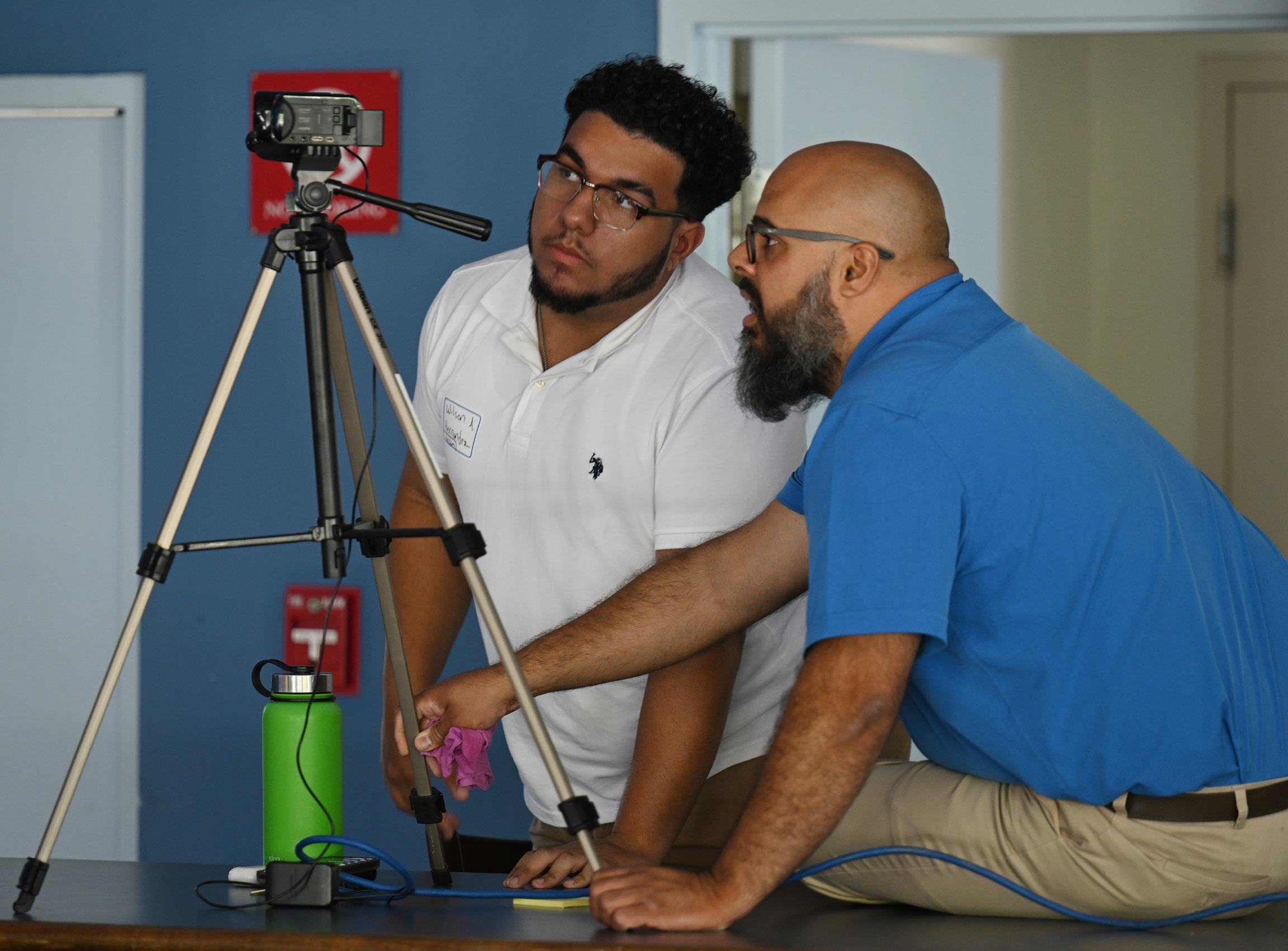 Summer Civic Leaders Wilson Hernandez ‘26 and Bella Castellano Palacios ‘25 offer the final presentation on their project Thursday, June 29, 2023 at Cro’s Nest. Pairs of students, generally rising second and third year, are matched with community organizations through the Holleran Center for Community Action and the Community Foundation of Eastern Connecticut.