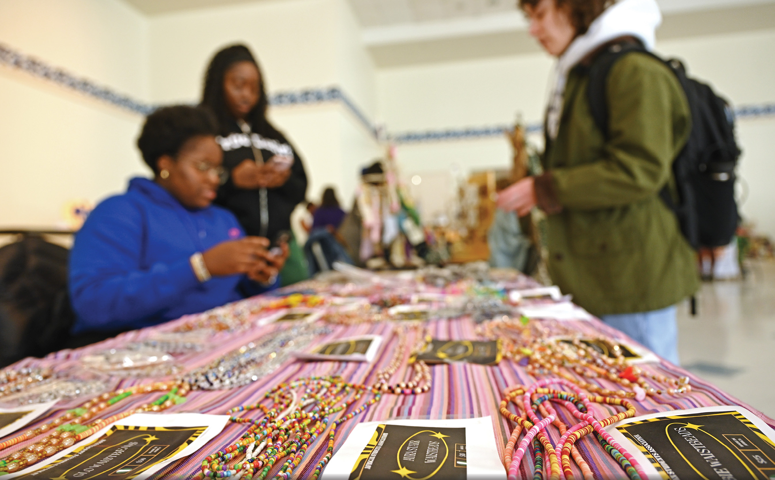 People around a craft table