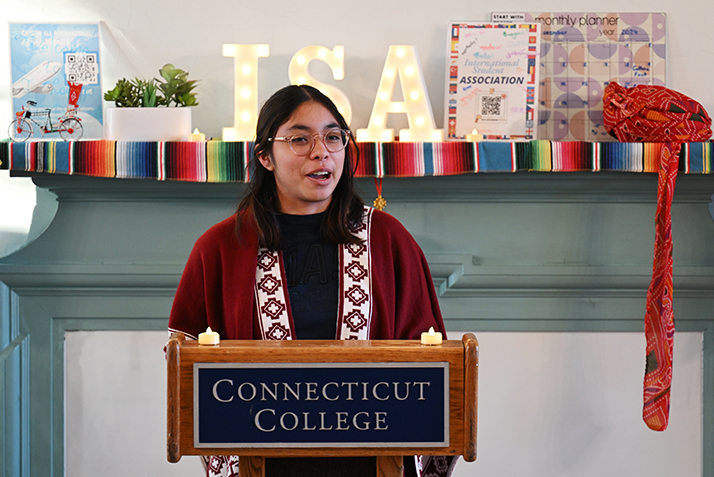 Elaine Sandoval Carrasco ’28 recites a poem during the opening of the International Student Lounge.