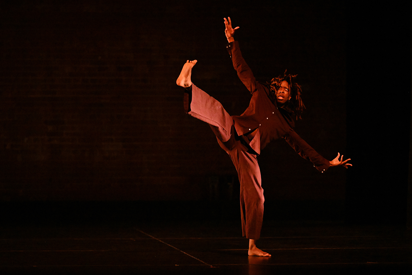 A college dance student performs a solo piece.