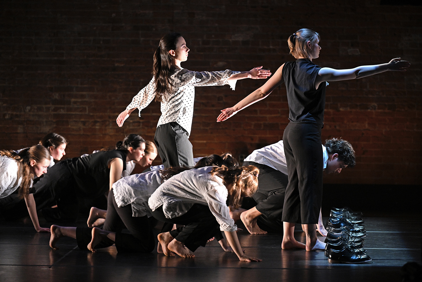 College dance students perform on stage.