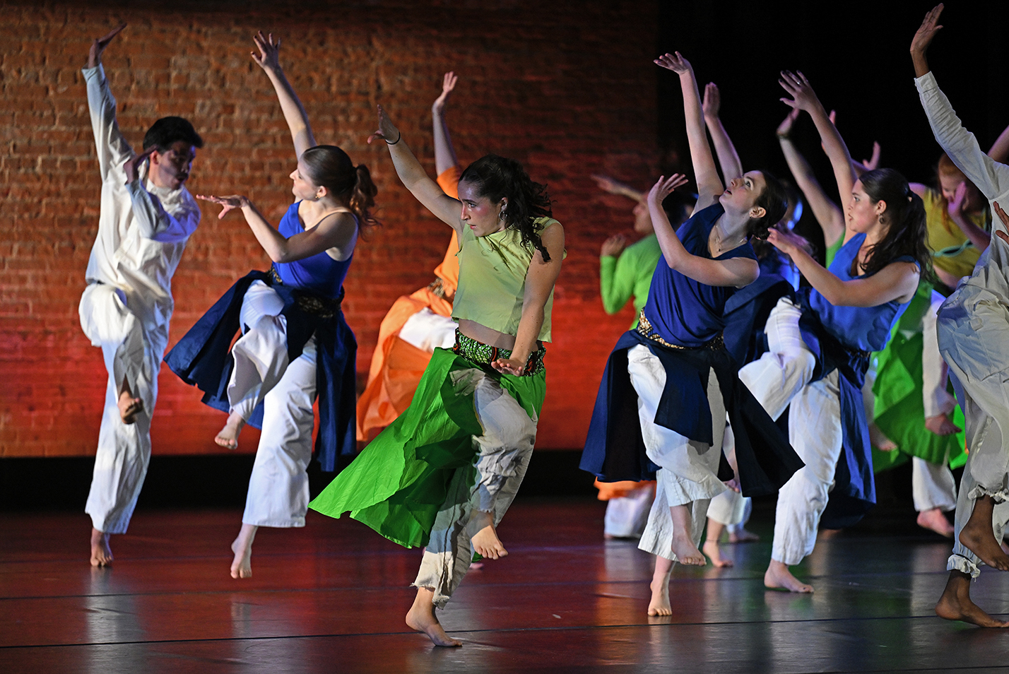 College dance students perform on stage.