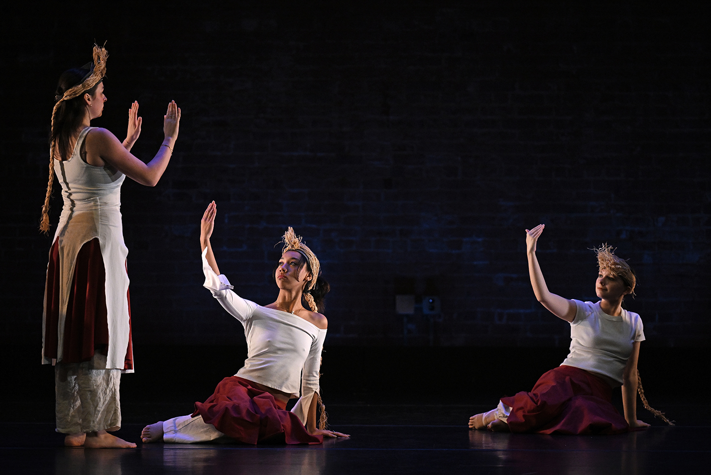 College dance students perform on stage.
