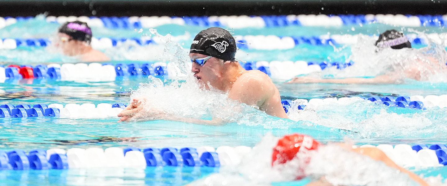 Carrick Shea ’28 swims breaststroke at the NCAA championships.
