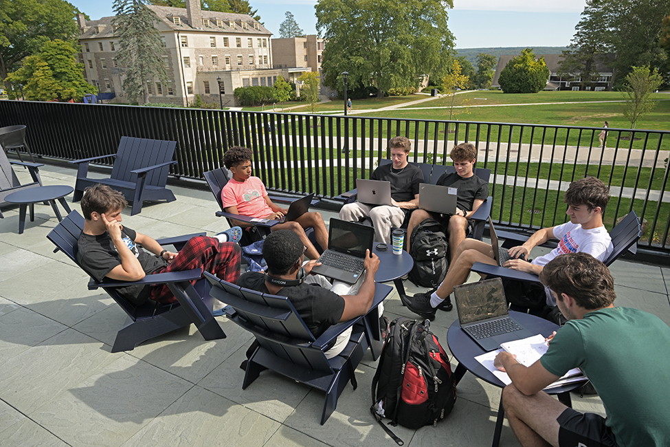 Students study in Cro's outdoor space.