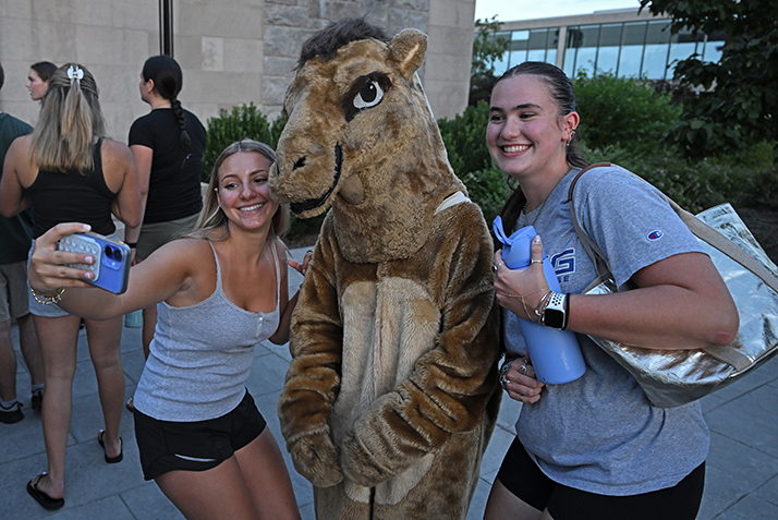New student take a selfie with the Camel.