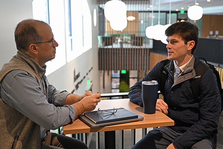 RJ Casey '26 meets with Dean of Students Victor Arcelus.