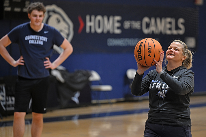 President Chapdelaine takes a shot at the basket while one of RJ Casey's teammates looks on.