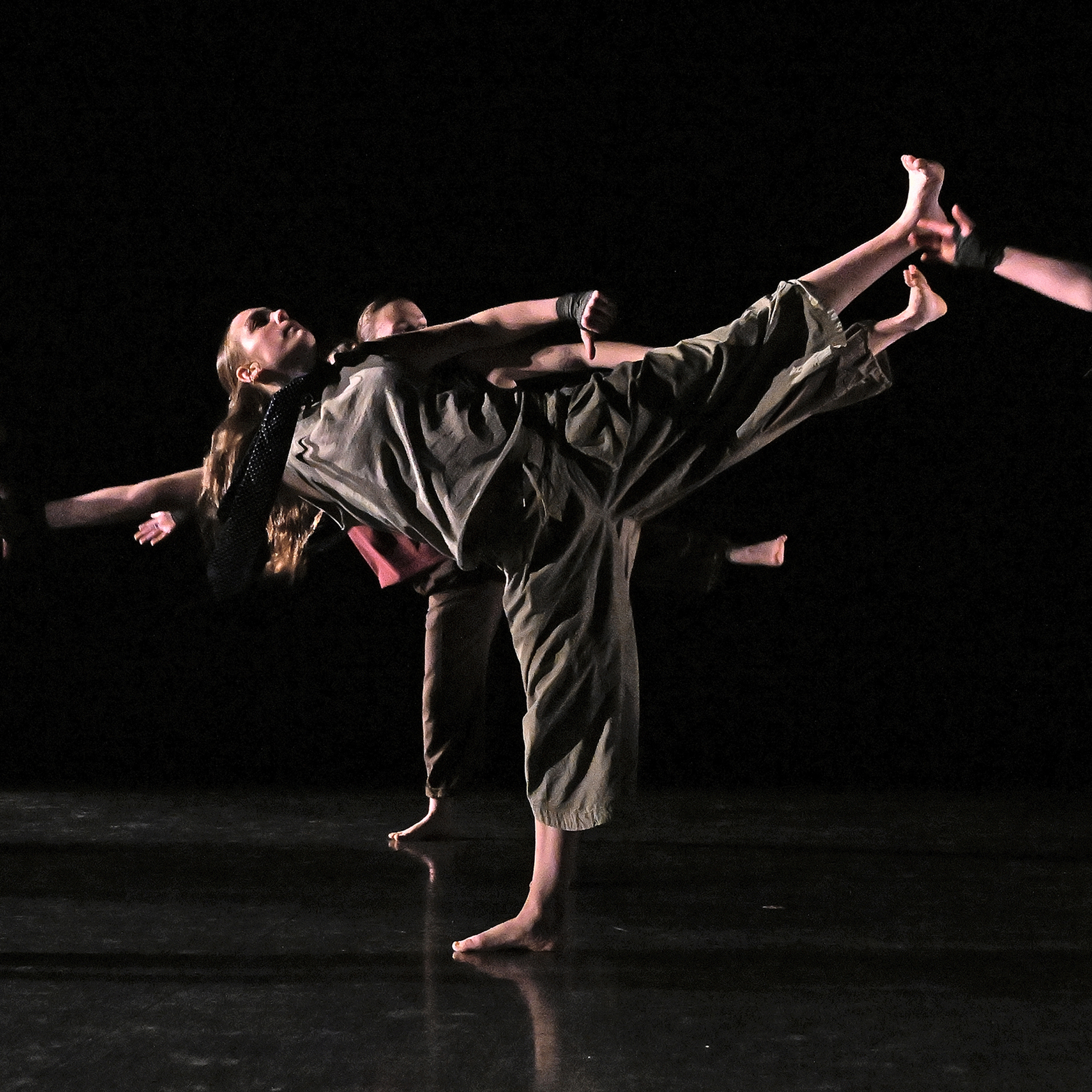 Student dancers perform on stage.