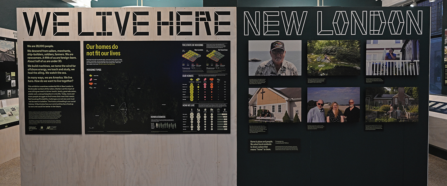 Several displays from the We Live Here exhibition