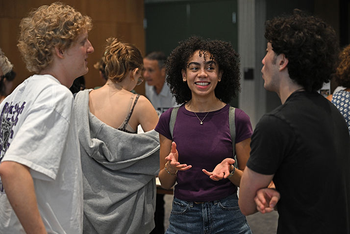 Students talk during the Academic Fair.