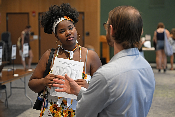 A student listens during the academic fair.