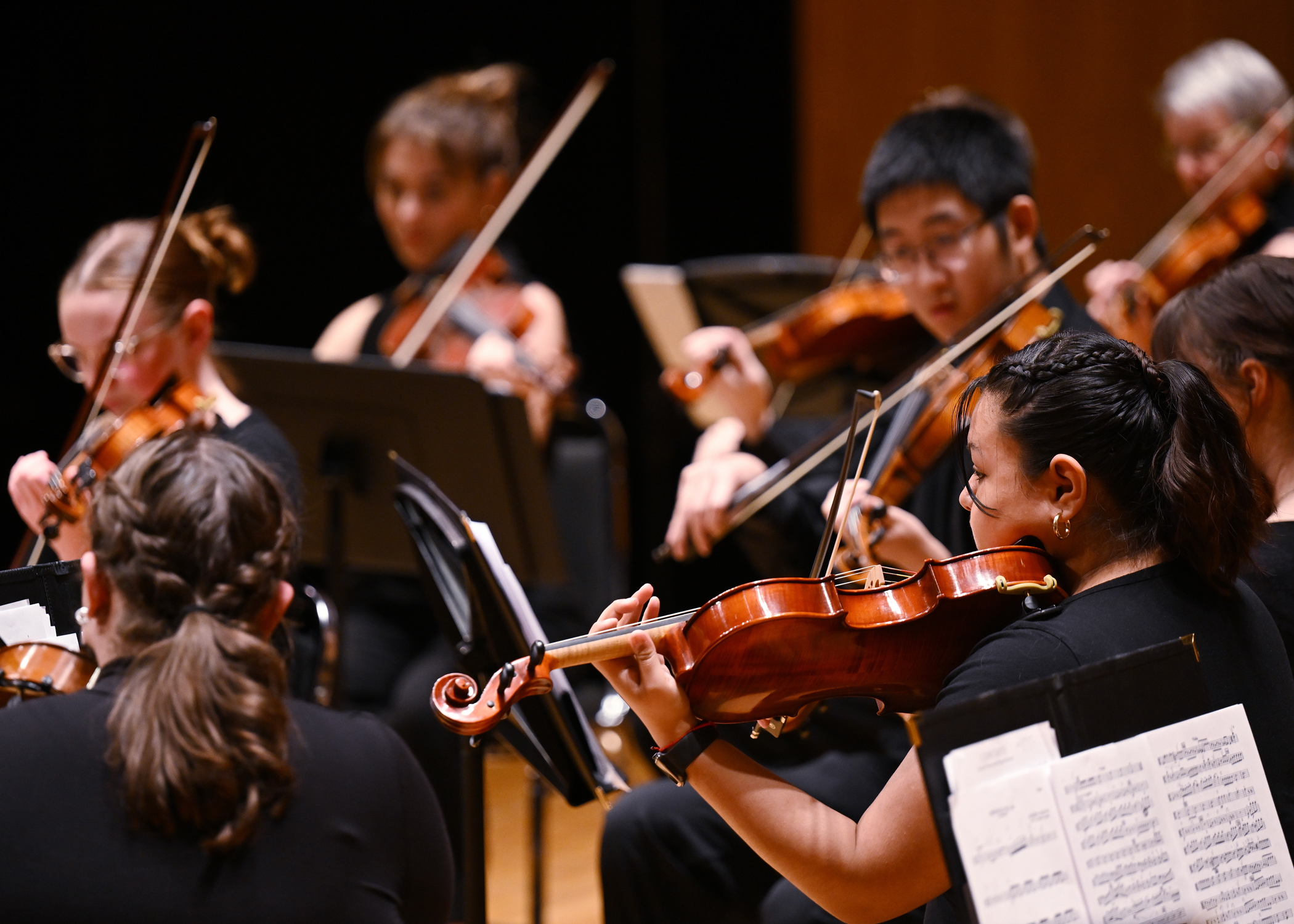 students playing violins