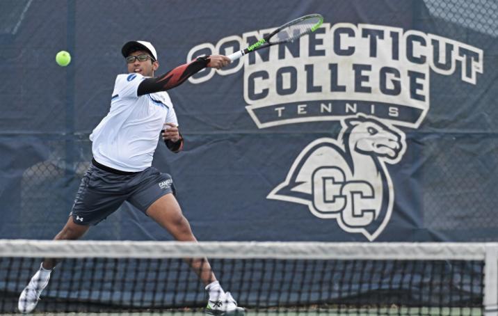 student playing tennis