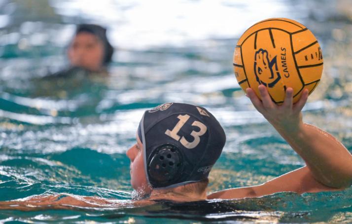 Student playing water polo