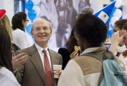 President Leo I. Higdon Jr. talks with students at Connecticut College's Founders Day celebration April 5.