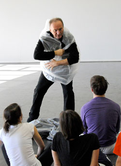 Au Cul Du Loup's Henri Ogier shows students how to make unique sounds with everyday objects.