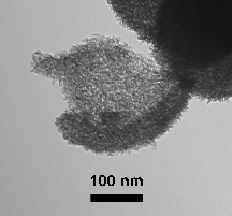 Hollow sphere with shells consisting of nanosized platelets, including a broken shell.
